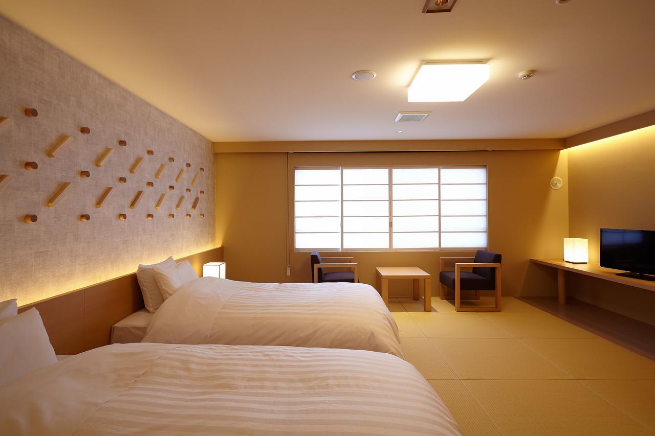 รีสอร์ต ชิน - ทะมะงะวะ ออนเซน Hotel Semboku ภายนอก รูปภาพ