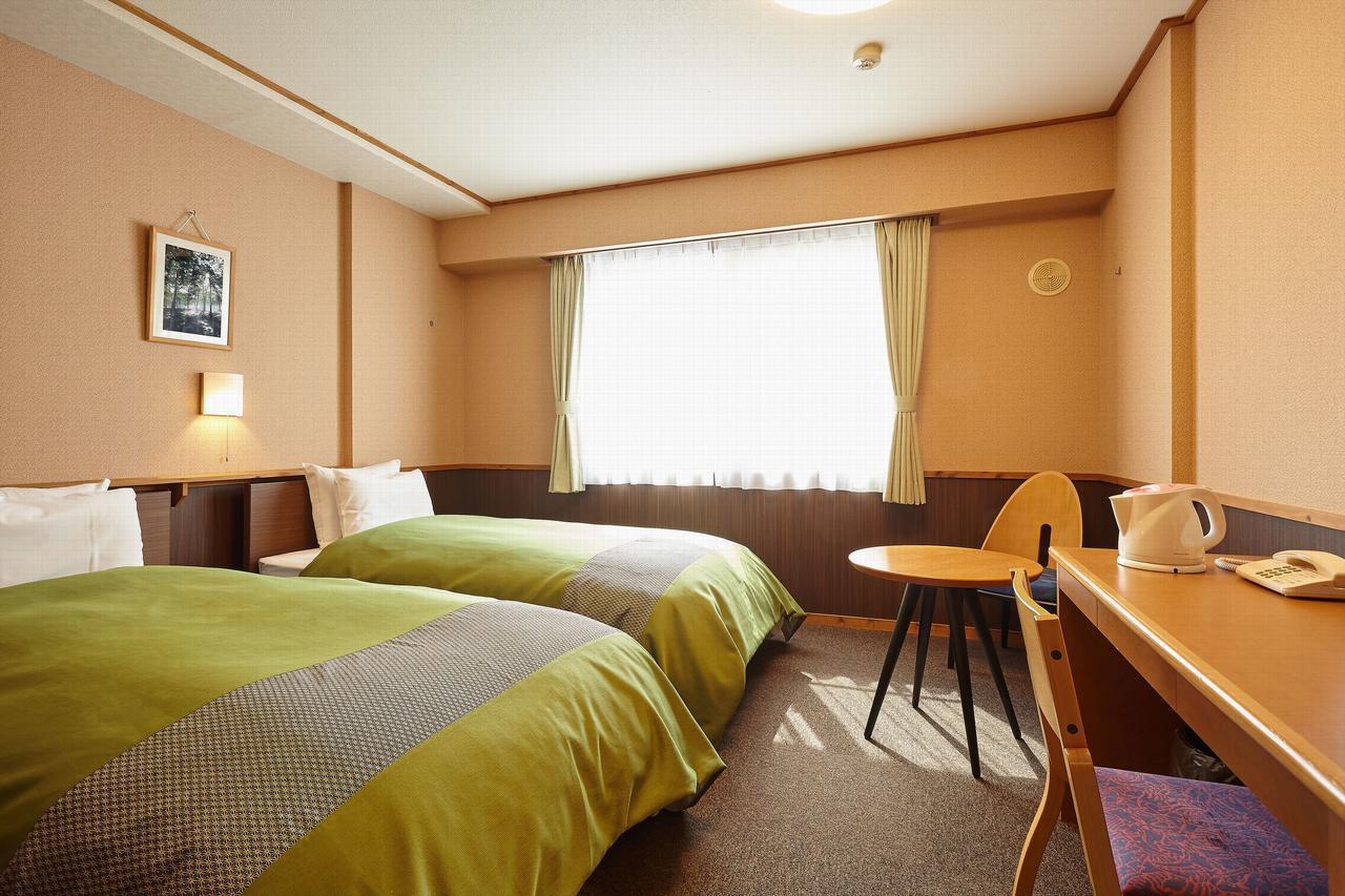 รีสอร์ต ชิน - ทะมะงะวะ ออนเซน Hotel Semboku ภายนอก รูปภาพ