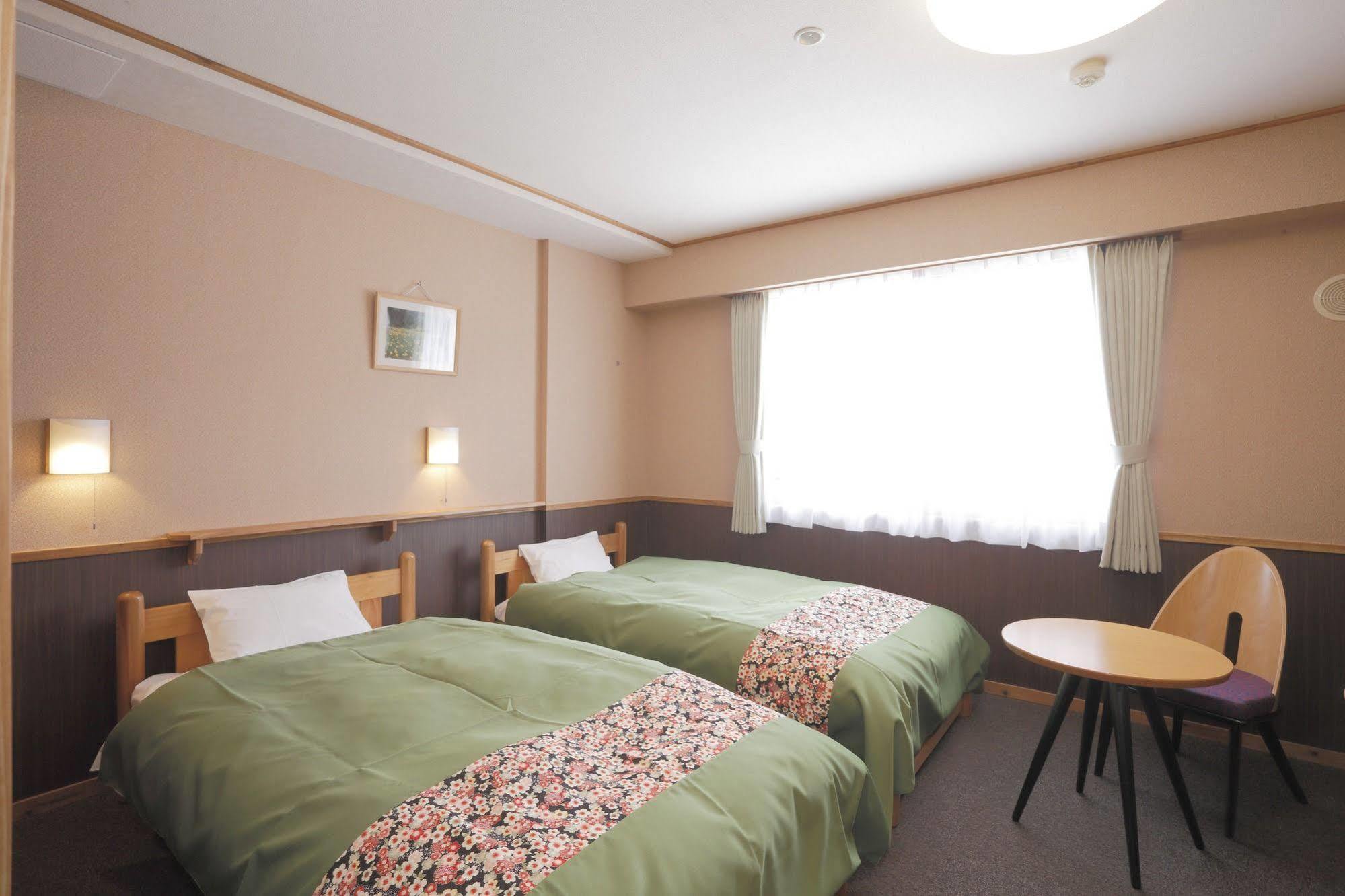 รีสอร์ต ชิน - ทะมะงะวะ ออนเซน Hotel Semboku ภายนอก รูปภาพ